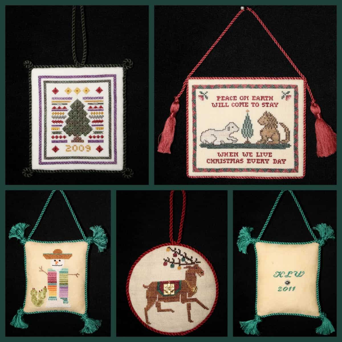 A group of cross-stitched Christmas ornaments.